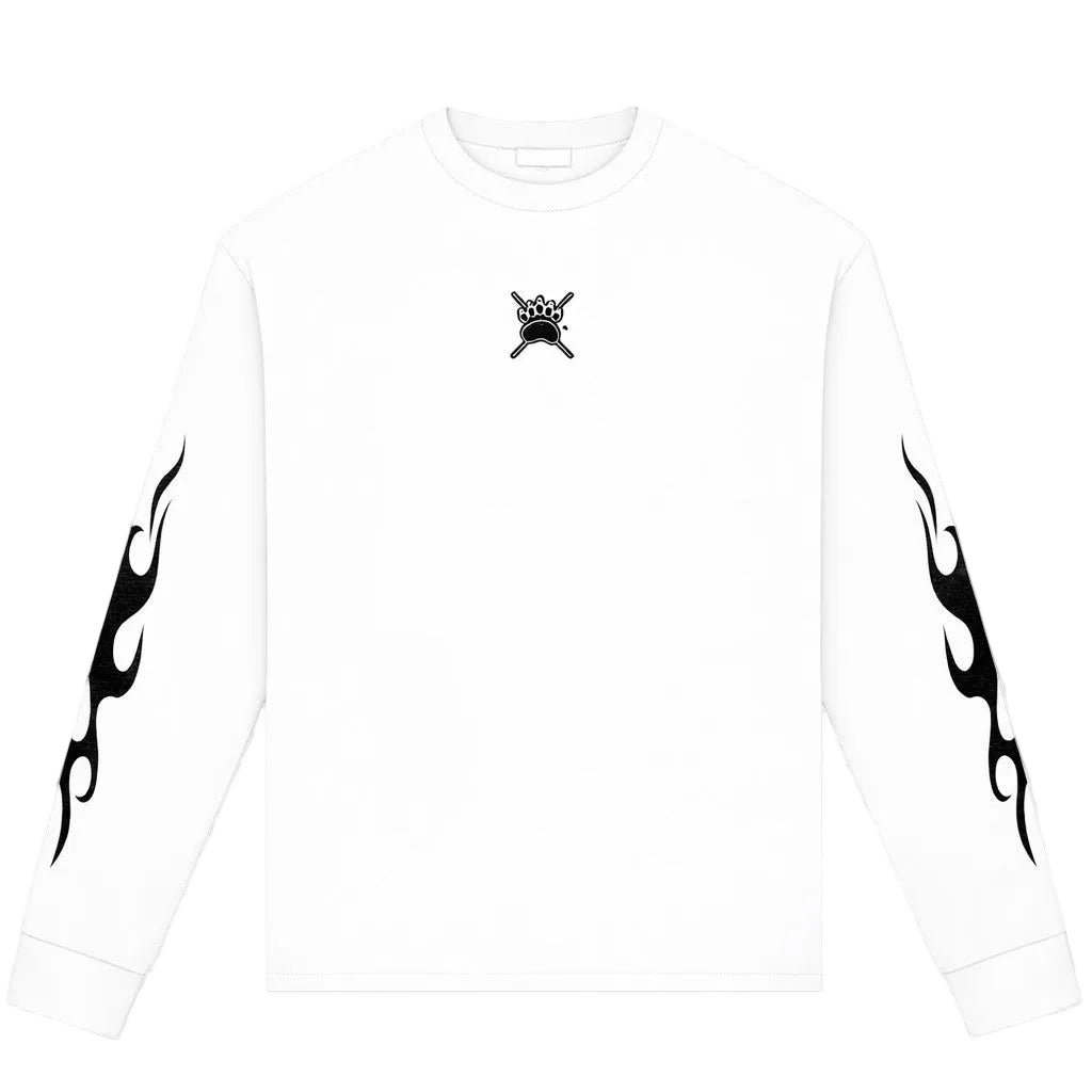 A white long-sleeve crewneck sweatshirt with a small black skull and crossbones graphic on the center chest and black flame motifs printed down both sleeves, shown against a light gray background.